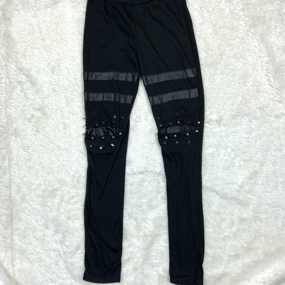 Black pants with spikes